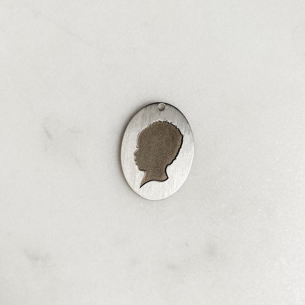 The *Statement* Silhouette Coin Charm