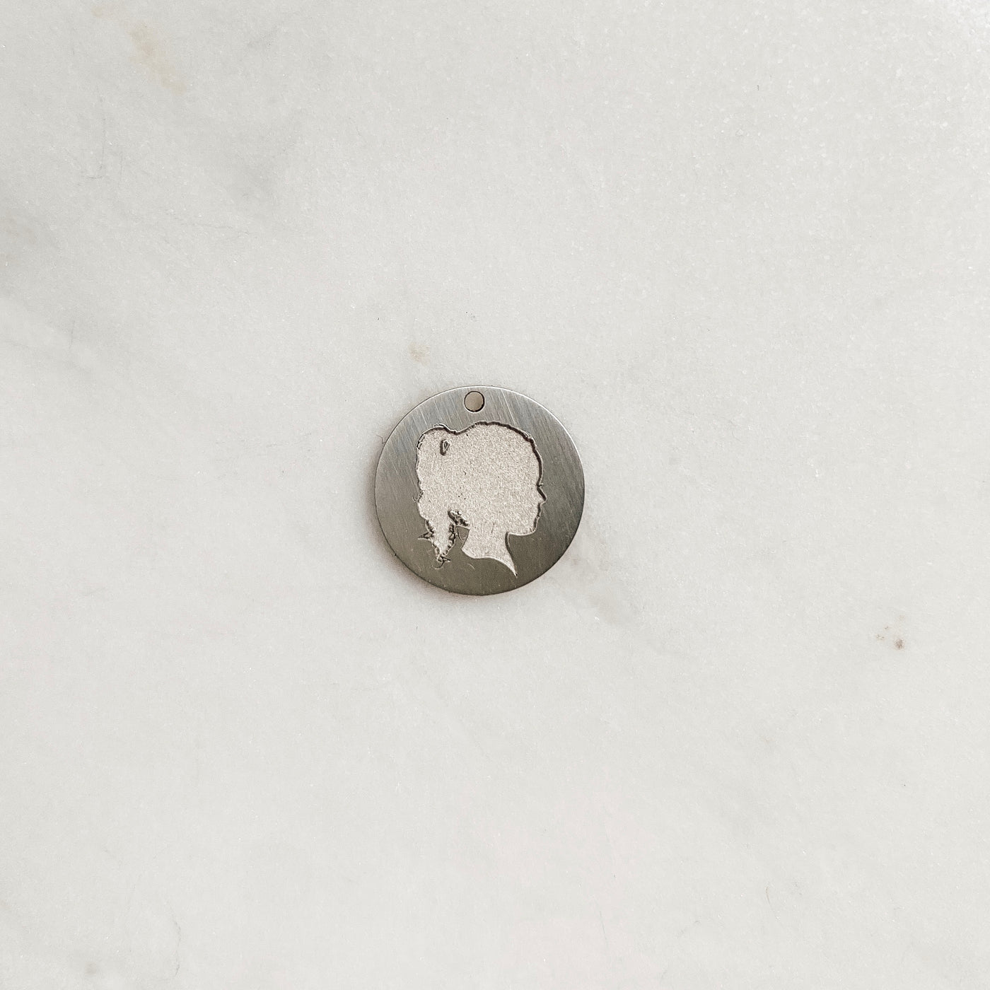 The *Everyday* Silhouette Coin Charm